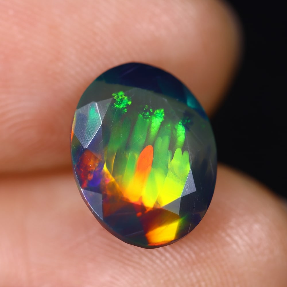 2.48Ct Ethiopian Black Smoked Opal, Faceted Cut - 12.1x9.3x5.6 mm , 623C: Ksmith Heritage Auctioneers Subject: Natural Ethiopian Welo Opal Origin: Ethiopia Treatment: Smoked