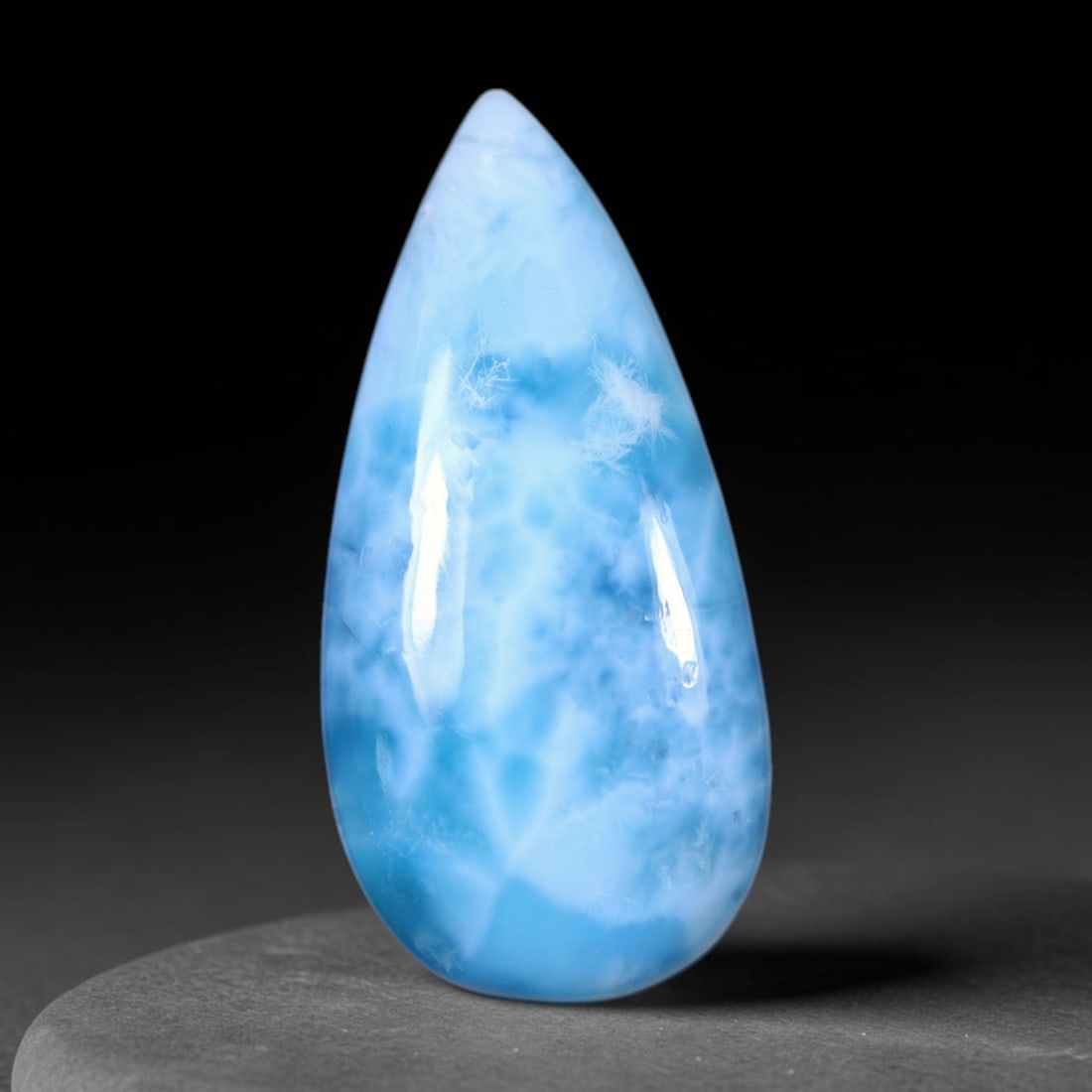 *30.32cts Natural Larimar - Polished Cabochon, 1197B: Ksmith Heritage Auctioneers Subject: Natural Larimar Carat Weight: 30.32 cts Dimension: 32x15.4x7.2 mm Type: Cabochon, Polished