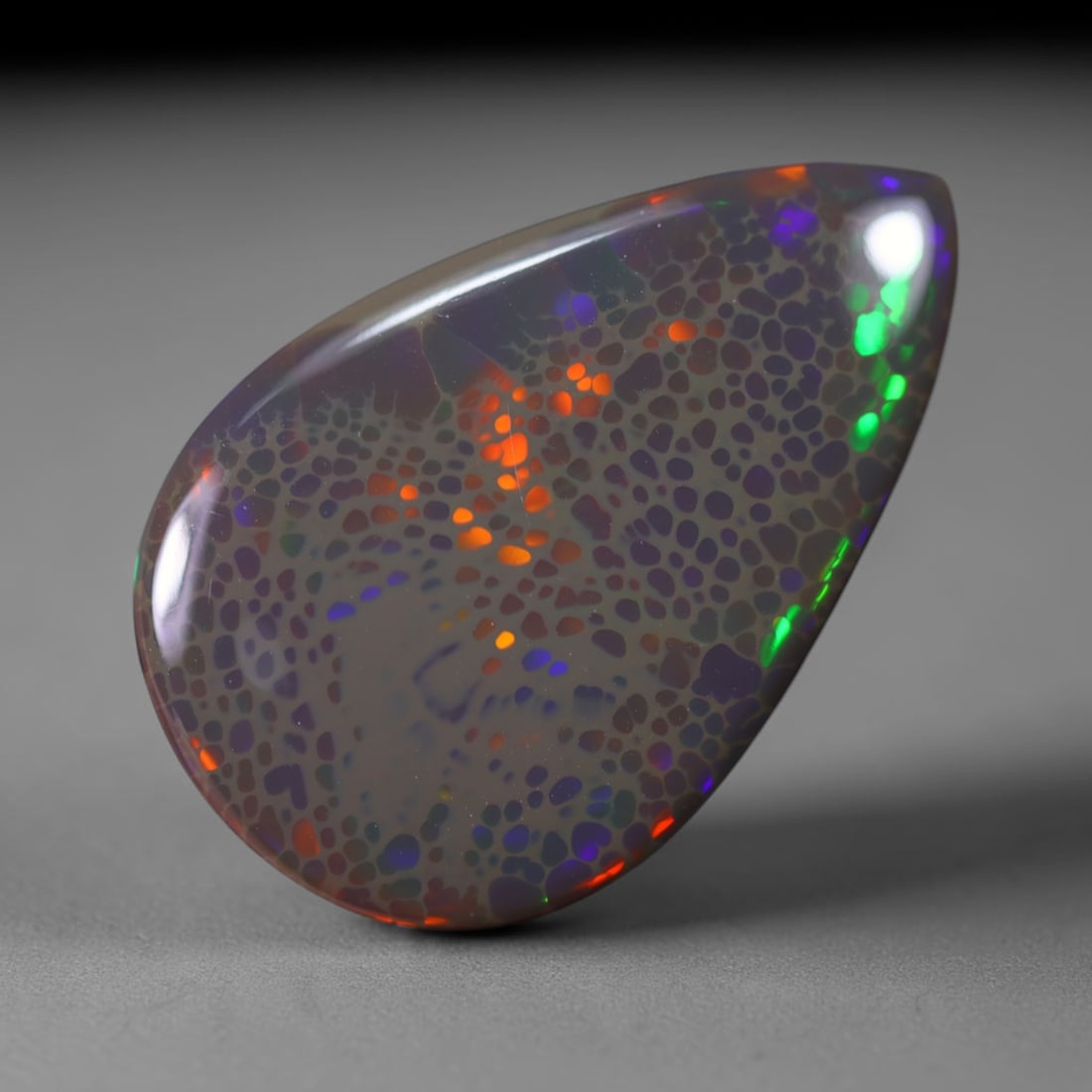 *14.86Ct Unheated Welo Opal Polished - Ethiopian Opal, 1250B: Ksmith Heritage Auctioneers Subject: Natural Ethiopian Welo Opal Origin: Ethiopia Carat Weight: 14.86Ct Dimension: 29x18.8x5.5 mm Treatment: Natural Untreated Type: Cabochon,