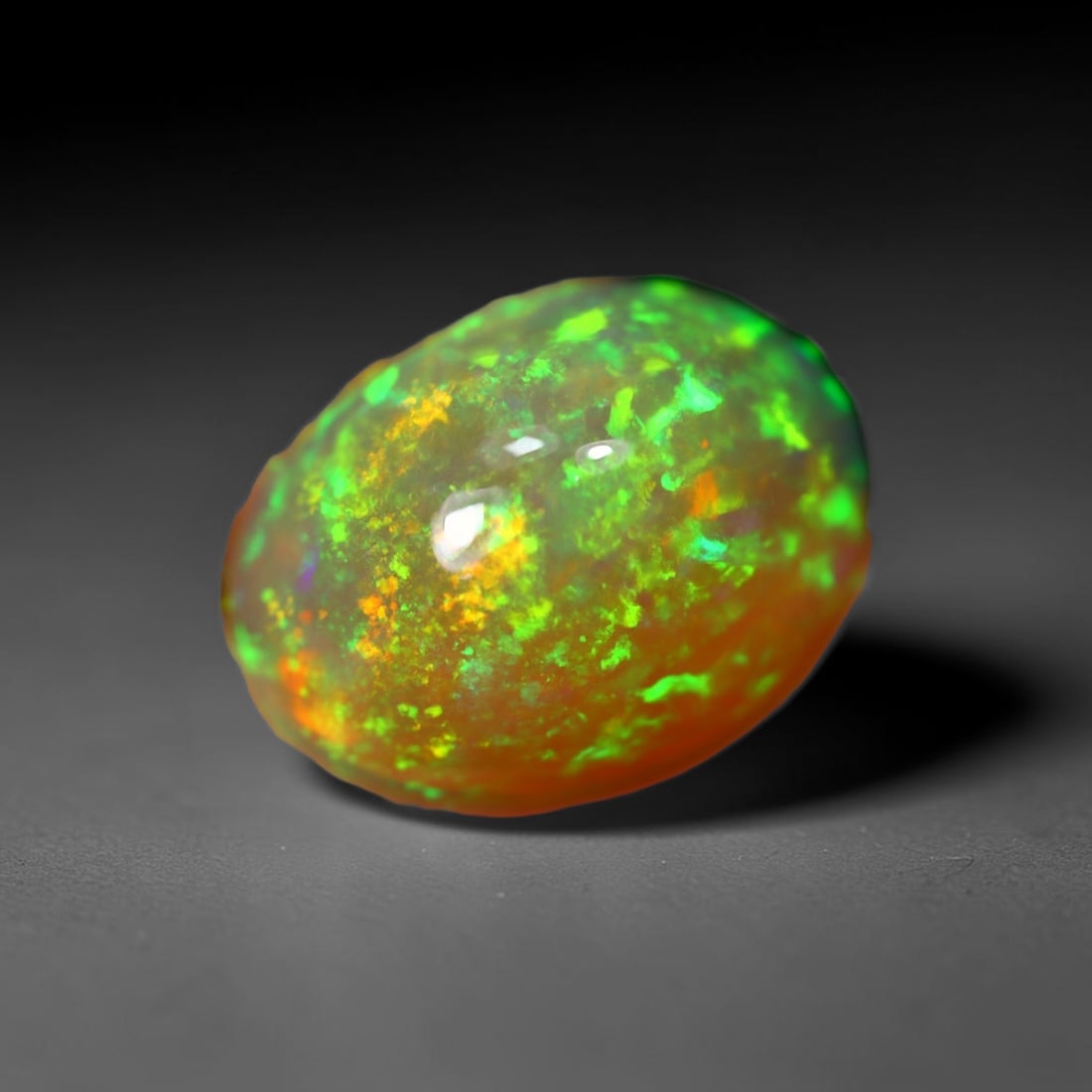 7.83Ct Welo Opal Polished - Ethiopian Opal - Oval Cabochon, 1032B: Ksmith Heritage Auctioneers Subject: Natural Ethiopian Welo Opal Origin: Ethiopia Carat Weight: 7.83Ct Dimension: 16.9 x 12.4 x 8 mm Treatment: Natural Untreated Shape: Oval