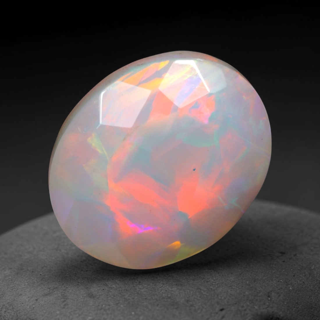 3.68Ct Natural Ethiopian Opal, Faceted Cut - 12.1x10.1x6.8 mm , 643C: Ksmith Heritage Auctioneers Subject: Natural Ethiopian Welo Opal Origin: Ethiopia Treatment: Unheated