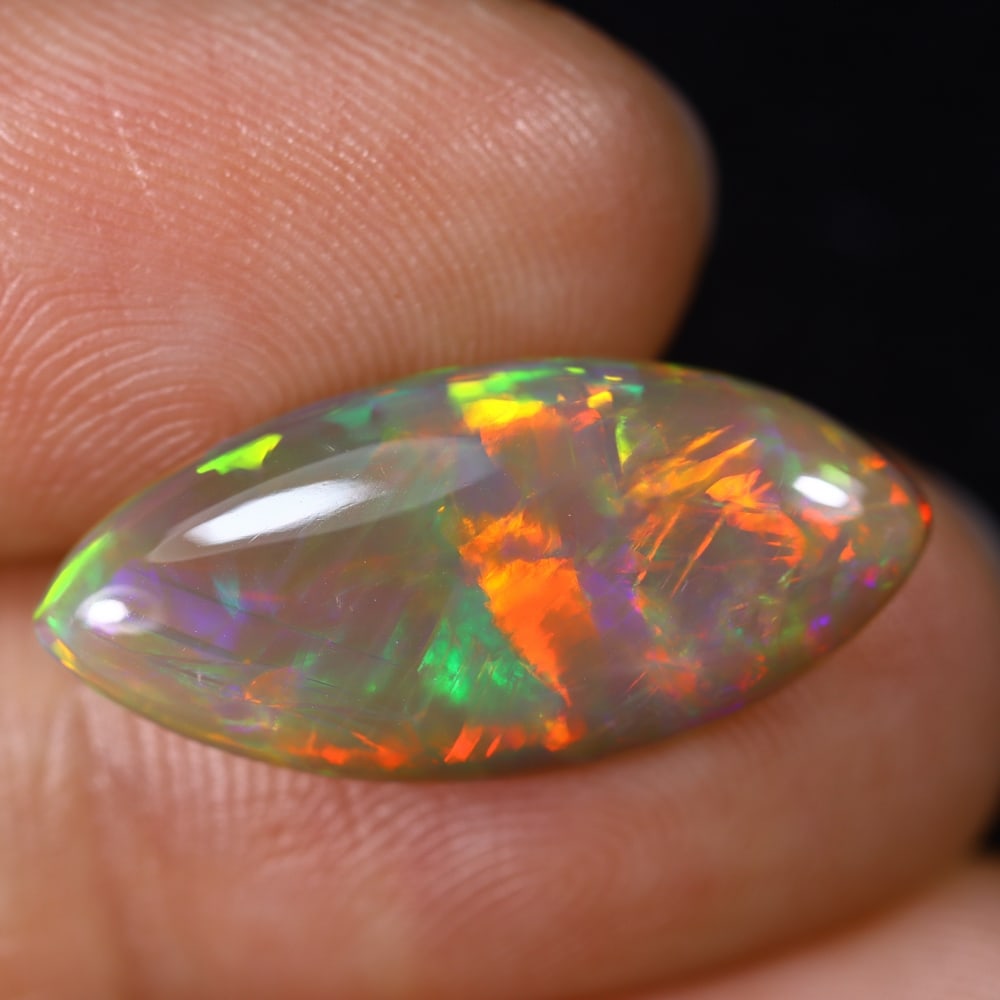 4.87Ct Natural Ethiopian Opal - 22.1x10.1x4.9 mm , 563C: Ksmith Heritage Auctioneers Subject: Natural Ethiopian Welo Opal Origin: Ethiopia Treatment: Unheated