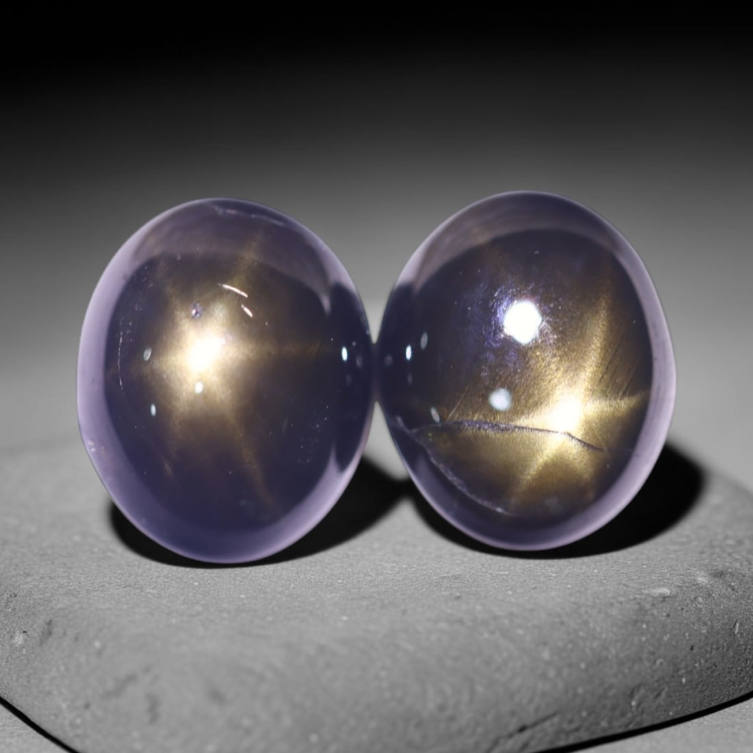 3.90cts 6 Rays Black Star Sapphire Pair , 918E: Ksmith Heritage Auctioneers Subject: Natural 6 Rays Star Sapphire Origin: Myanmar Carat Weight: 3.90cts Dimension: 7.9x6.5x3 mm Treatment: Diffusion Type: Cabochon, Polish