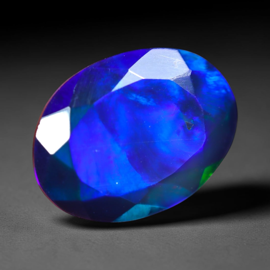 1.92Ct Natural Smoked Ethiopian Black Opal, Faceted Cut - 10.9x8.3x5.1 mm , 694C: Ksmith Heritage Auctioneers Subject: Natural Ethiopian Welo Opal Origin: Ethiopia Treatment: Smoked