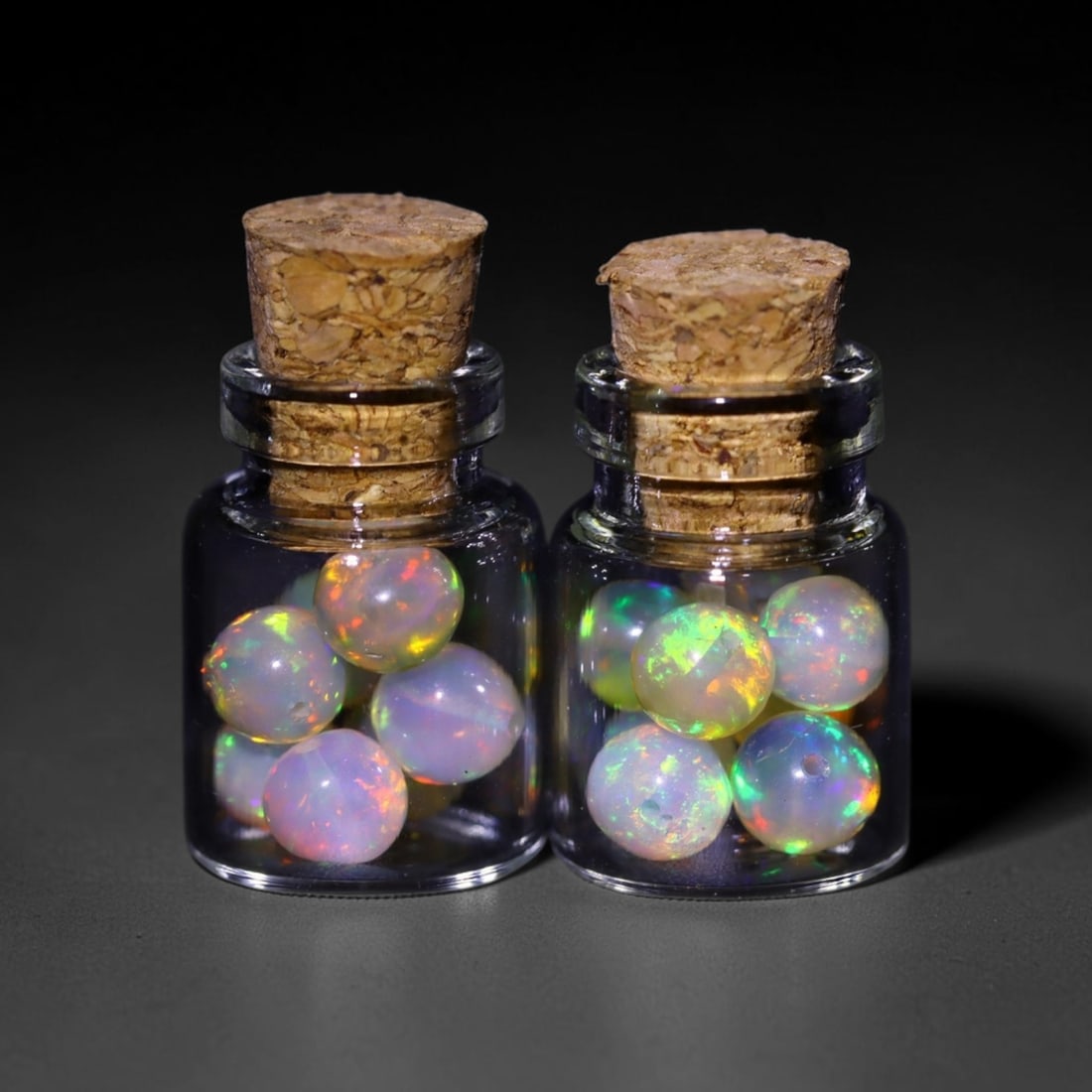 Twin Pack - 4.5mm Ethiopian Opal Ball in Display Jar - Bottle Size 1.5cm , 71C: Ksmith Heritage AuctioneersSubject: Natural Opal (with bottle) Origin: Ethiopia Treatment: Unheated