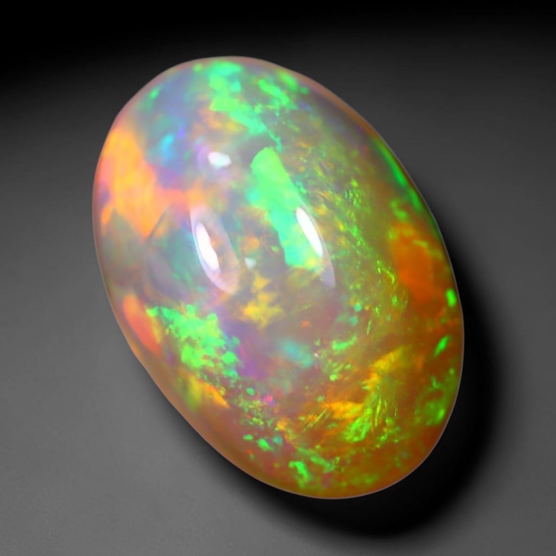*7.29Ct Welo Opal Polished - Ethiopian Opal - Oval Cabochon, 989B: Ksmith Heritage Auctioneers Subject: Natural Ethiopian Welo Opal Origin: Ethiopia Carat Weight: 7.29Ct Dimension: 16.7 x 11.6 x 7.9 mm Treatment: Natural Untreated Shape: Oval