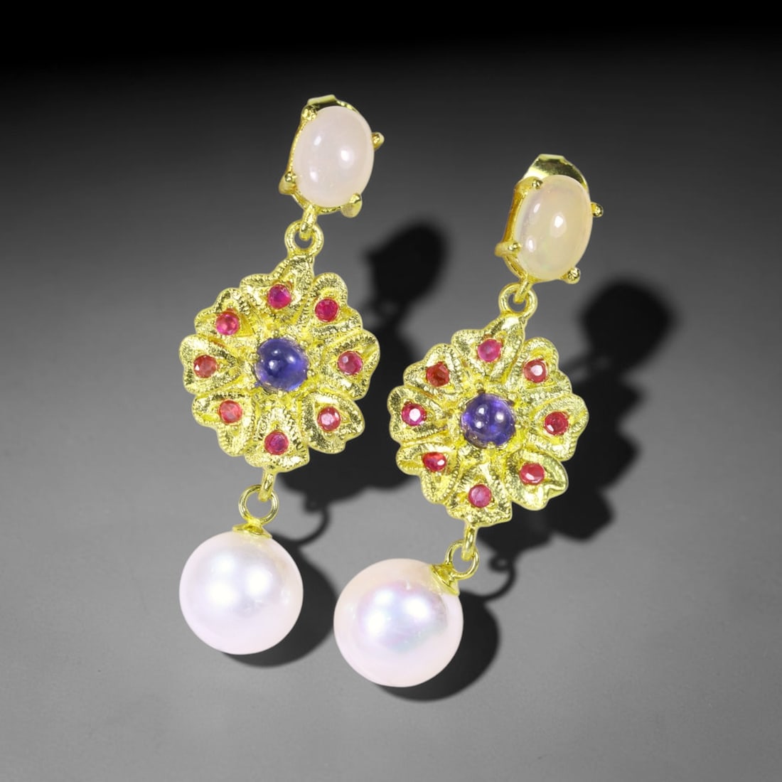 Earrings Pearl Sapphire & Ruby - 925 Sterling Silver , 821E: Ksmith Heritage Auctioneers Subject: Natural Pearl, Sapphire & Ruby Origin: Thailand Carat Weight: 42.56ct Dimension: Gemstone 1.7-10mm Type: Earrings