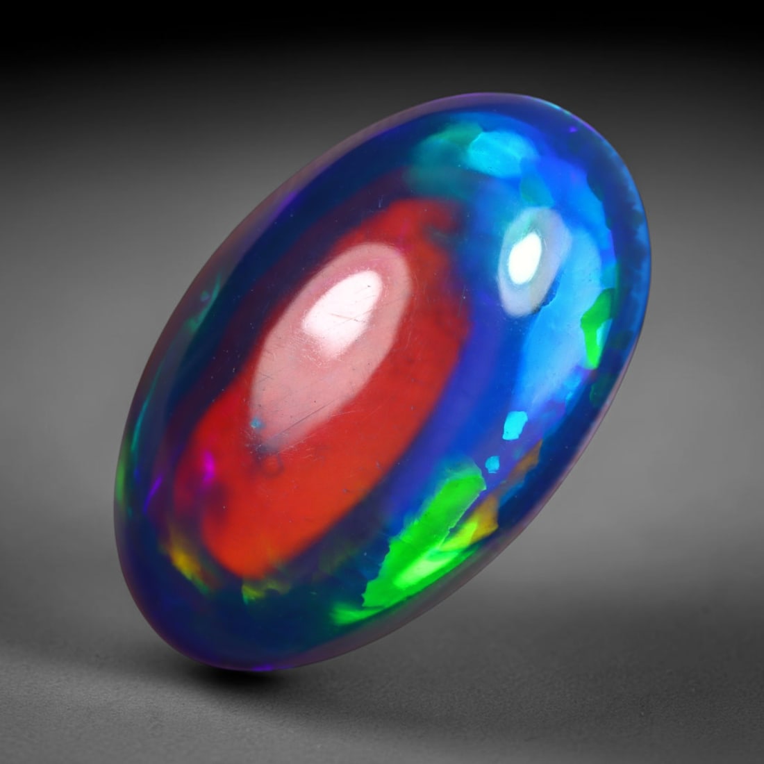 2.85Ct Natural Ethiopian Black Opal - 16.0x10.0x4.4 mm , 807C: Ksmith Heritage Auctioneers Subject: Natural Ethiopian Welo Opal Origin: Ethiopia Treatment: Smoked