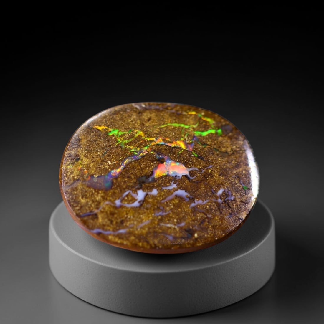*4.26Ct Boulder Opal - Australian Opal , 193C: Ksmith Heritage Auctioneers Subject: Natural Boulder Opal Origin: Australia Carat Weight: 4.26Ct Dimension: 12.4x9.4x3.9 mm Treatment: Natural Untreated Type: Cabochon, Po
