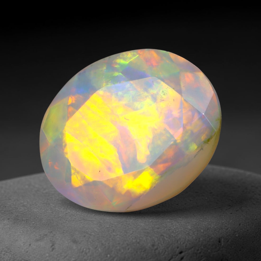 2.73Ct Natural Ethiopian Opal, Faceted Cut - 11.9x10.0x5.4 mm , 669C: Ksmith Heritage Auctioneers Subject: Natural Ethiopian Welo Opal Origin: Ethiopia Treatment: Unheated