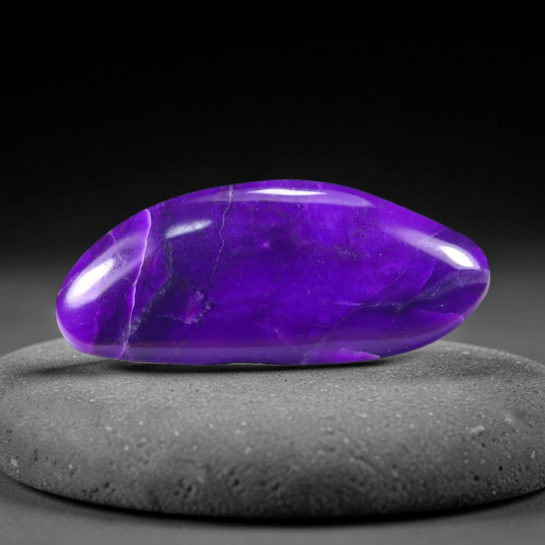 13.47cts Natural Rare Purple Sugilite Cabochon - No treated , 994E: Ksmith Heritage Auctioneers Subject: Natural Sugilite Origin: South Africa Carat Weight: 13.47Ct Dimension: 31.2x13.3x3.7 mm Treatment: No Treatment Type: Cabochon, Polish
