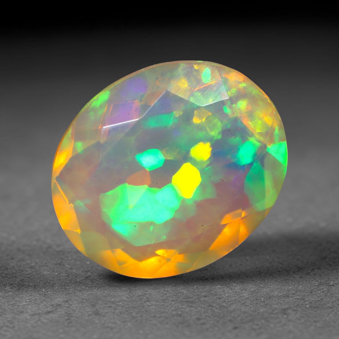 3.02Ct Natural Ethiopian Opal, Faceted Cut - 11.9x10.1x5.4 mm , 635C: Ksmith Heritage Auctioneers Subject: Natural Ethiopian Welo Opal Origin: Ethiopia Treatment: Unheated