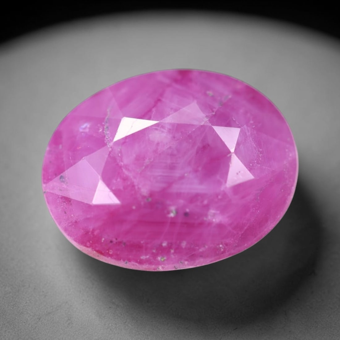 5.41Ct Red Ruby - Polished Faceted , 207E: Ksmith Heritage Auctioneers Subject: Natural Ruby Origin: Burma Carat Weight: 5.41Ct Dimension: 11.4x9.1x6 mm Treatment: Heated Type: Faceted, Polished