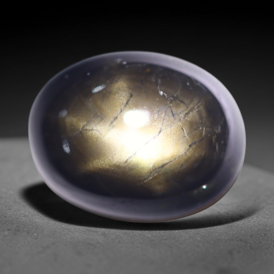 *2.68Ct 6 Rays Black Star Sapphire - Polished Cabochon, 1052B: Ksmith Heritage Auctioneers Subject: Natural 6 Rays Star Sapphire Origin: Myanmar Carat Weight: 2.68Ct Dimension: 9.1x6.8x3.5 mm Treatment: Diffusion Type: Cabochon, Polished
