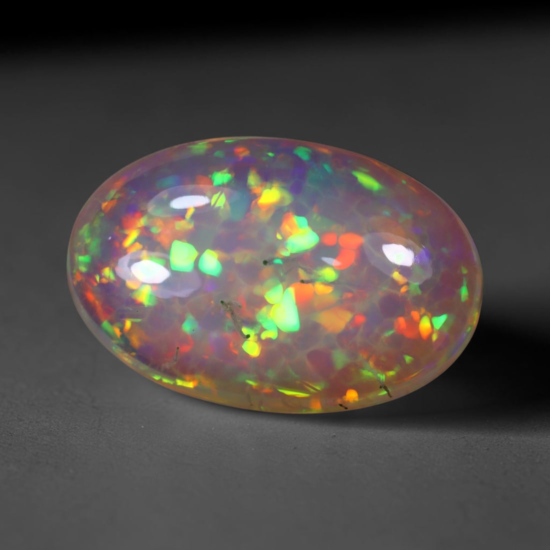 6.44Ct Natural Ethiopian Opal , Unheated - 17.5x11.5x5.9 mm , 826C: Ksmith Heritage Auctioneers Subject: Natural Ethiopian Welo Opal Origin: Ethiopia Treatment: Unheated
