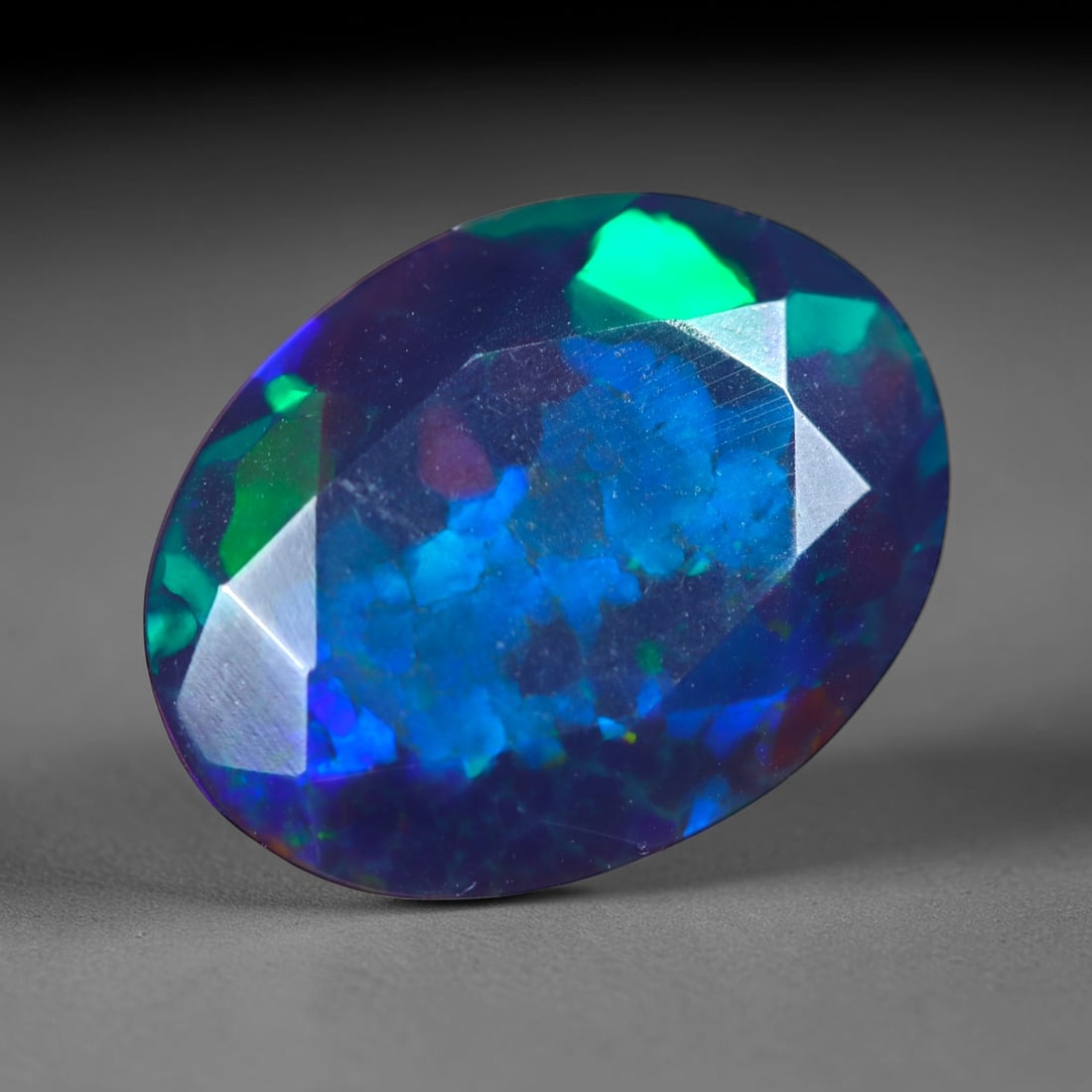 1.95Ct Natural Smoked Ethiopian Black Opal, Faceted Cut - 11.6x8.9x5.3 mm , 715C: Ksmith Heritage Auctioneers Subject: Natural Ethiopian Welo Opal Origin: Ethiopia Treatment: Smoked