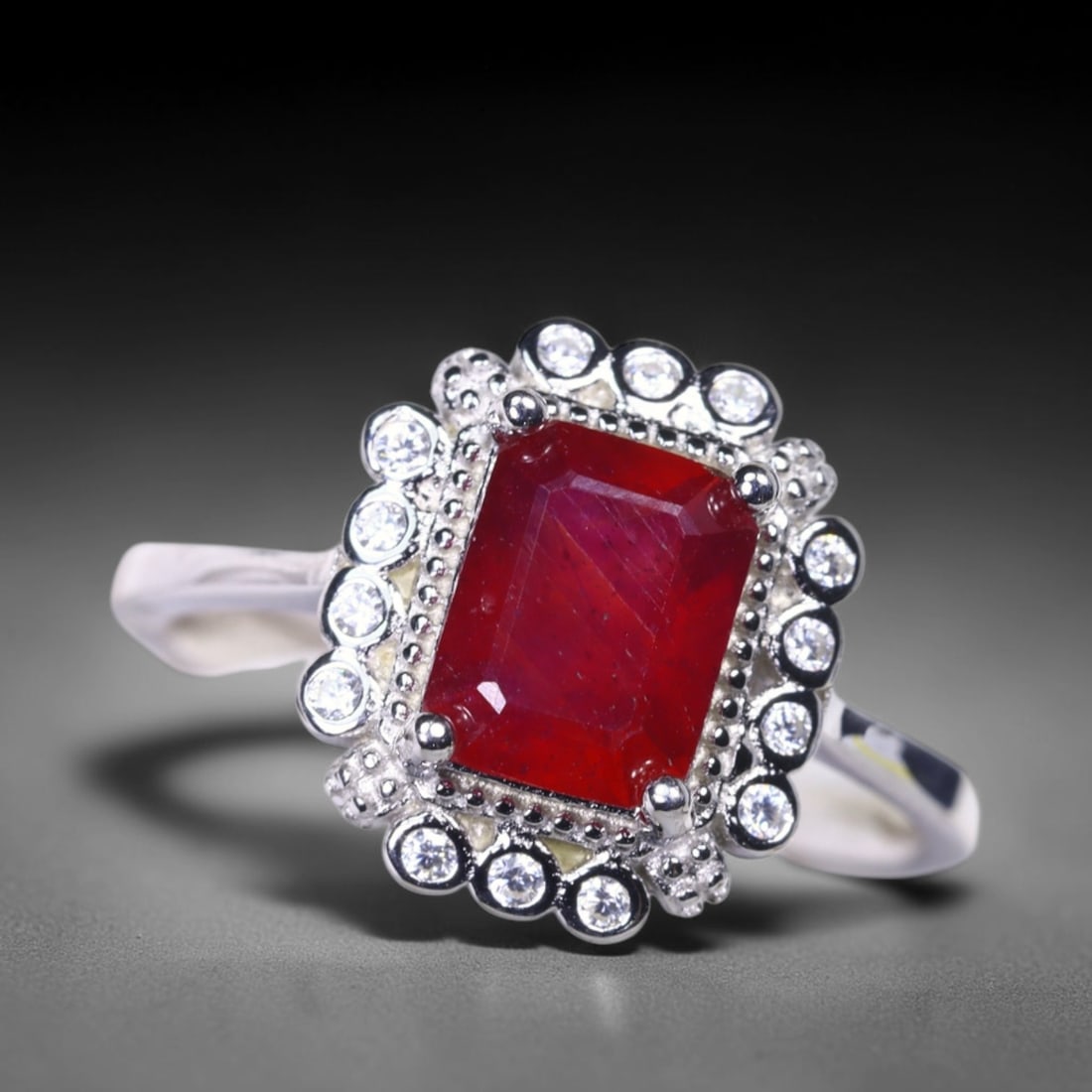 Ring US7 Ruby & Simulated CZ - 925 Sterling Silver - Plated 14k White Gold , 1181E: Ksmith Heritage Auctioneers Subject: Natural Ruby & Simulated CZ Origin: Thailand Carat Weight: 2.76g Dimension: Ruby 6x8mm Type: Ring
