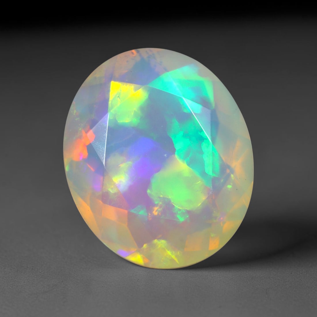 3.67Ct Natural Ethiopian Opal, Faceted Cut - 12.2x10.2x6.4 mm , 636C: Ksmith Heritage Auctioneers Subject: Natural Ethiopian Welo Opal Origin: Ethiopia Treatment: Unheated