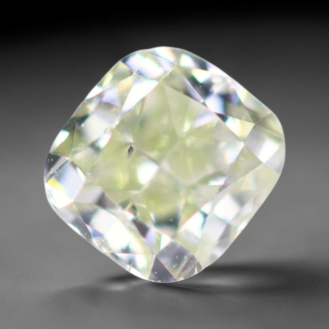 0.22Ct Fancy Diamond - Polished Faceted , 986E: Ksmith Heritage Auctioneers Subject: Natural Diamond Origin: Africa Carat Weight: 0.22Ct Dimension: 3.3x3.2x2.3 mm Treatment: Unheated Type: Faceted, Polished