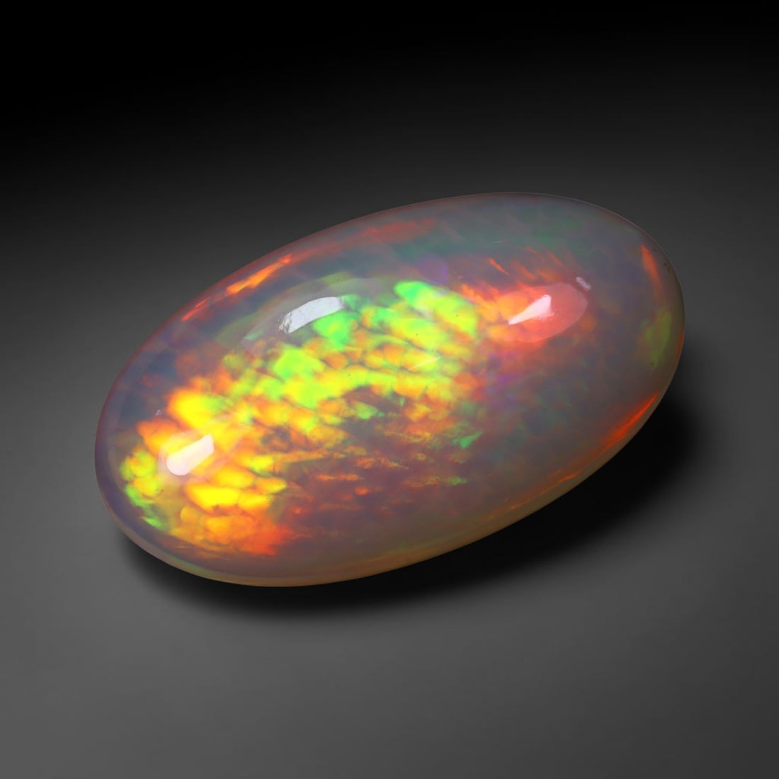 5.58Ct Natural Ethiopian Opal , Unheated - 18.3x10.3x6.2 mm , 825C: Ksmith Heritage Auctioneers Subject: Natural Ethiopian Welo Opal Origin: Ethiopia Treatment: Unheated