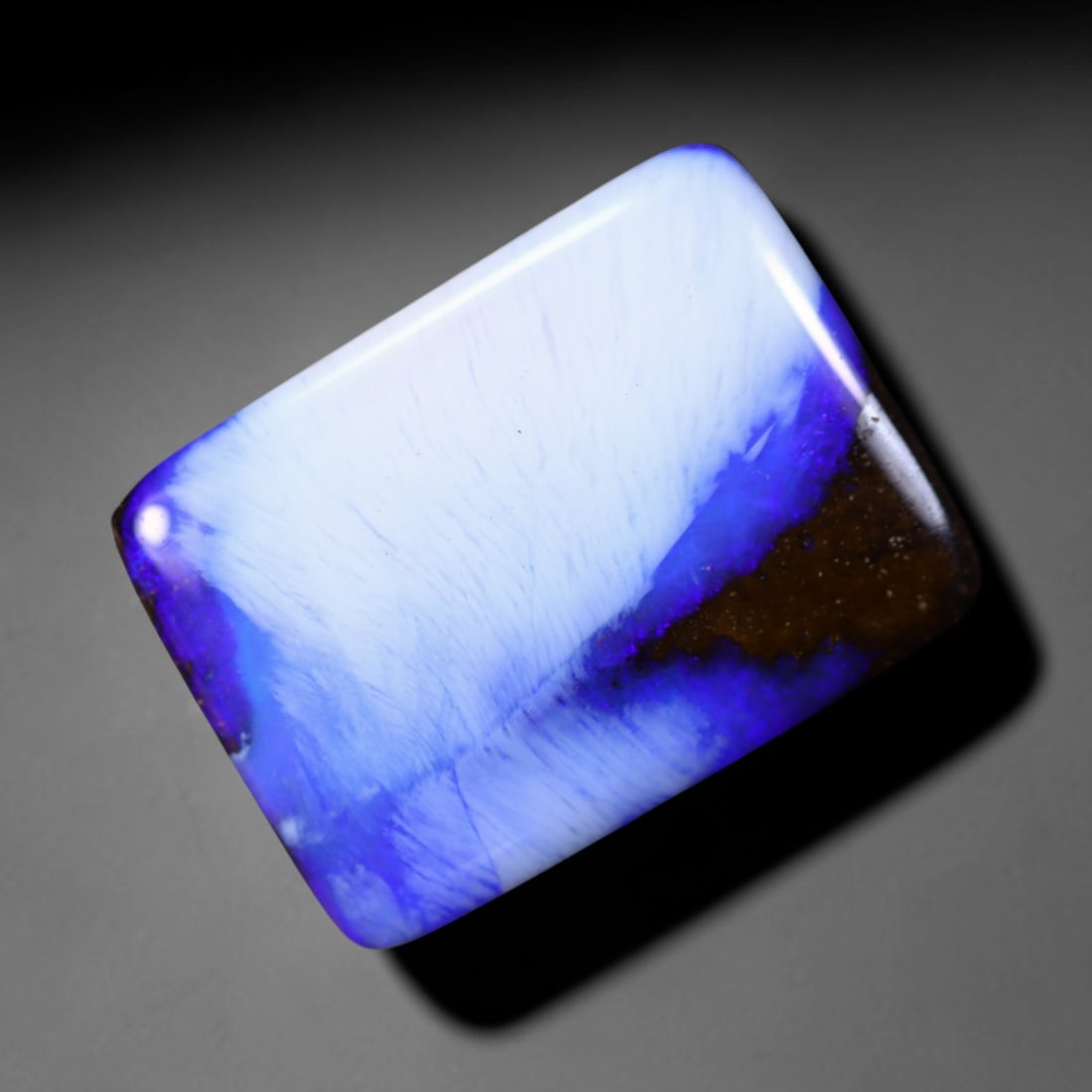 11.33Ct Blue Boulder Opal - Australian Opal , 861E: Ksmith Heritage Auctioneers Subject: Natural Boulder Opal Origin: Australia Carat Weight: 11.33Ct Dimension: 16.1x12.1x4.2 mm Treatment: Natural Untreated Type: Cabochon,