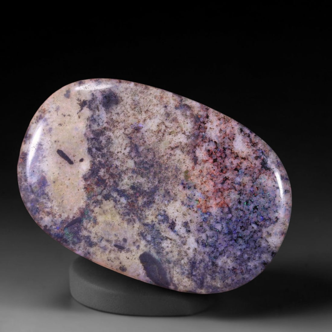 23.52Ct Andamooka Opal - Australian Opal, 366B: Ksmith Heritage Auctioneers Subject: Natural Andamooka Opal Origin: Australia Carat Weight: 23.52Ct Dimension: 32x21.6x4.3 mm Treatment: Sugar Treated Type: Cabochon, Polished<