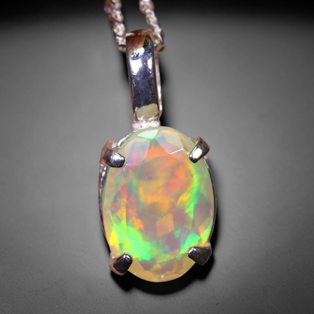 1.68g Natural Opal Stone Sterling Silver 925 Necklace (Pendant with Chain) , 891E: Ksmith Heritage Auctioneers Subject: Natural Ethiopian Opal Necklace Origin: Ethiopia Pendant Dimension : 18x6mm (included clasp) Stone Dimension: 11x8mm Treatment: Natural Untrea