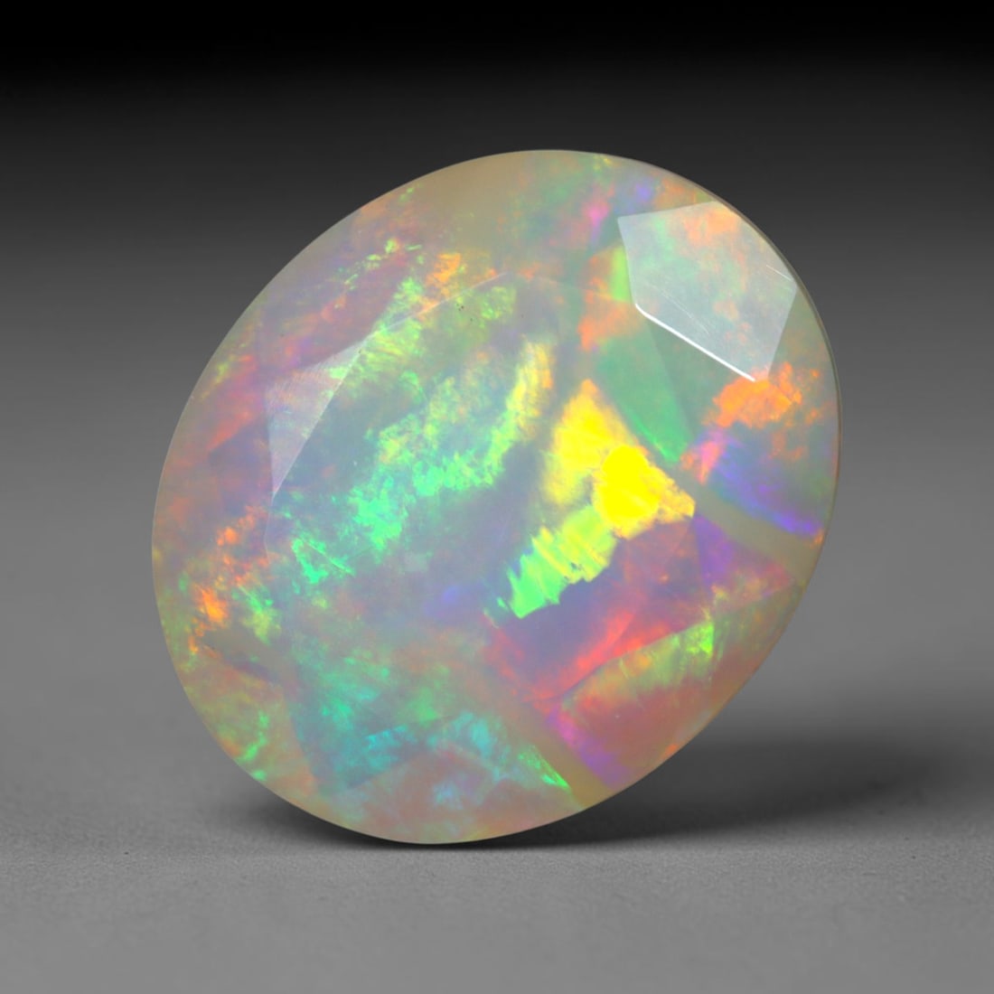 2.81Ct Natural Ethiopian Opal, Faceted Cut - 12.1x10.0x5.7 mm , 658C: Ksmith Heritage Auctioneers Subject: Natural Ethiopian Welo Opal Origin: Ethiopia Treatment: Unheated