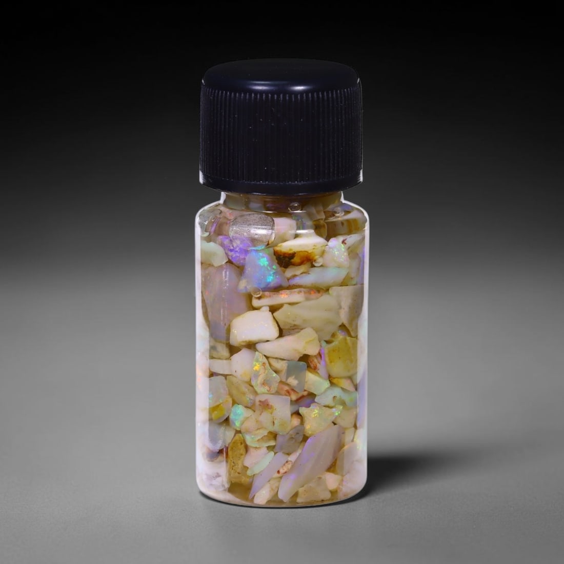 Australian Lightning Ridge Crystal Black Opal Rough Chip Jar (Good For Display), 943B: Ksmith Heritage Auctioneers Subject: Natural Australian Opal Origin: Australia Quantity: 1 Jar as photo