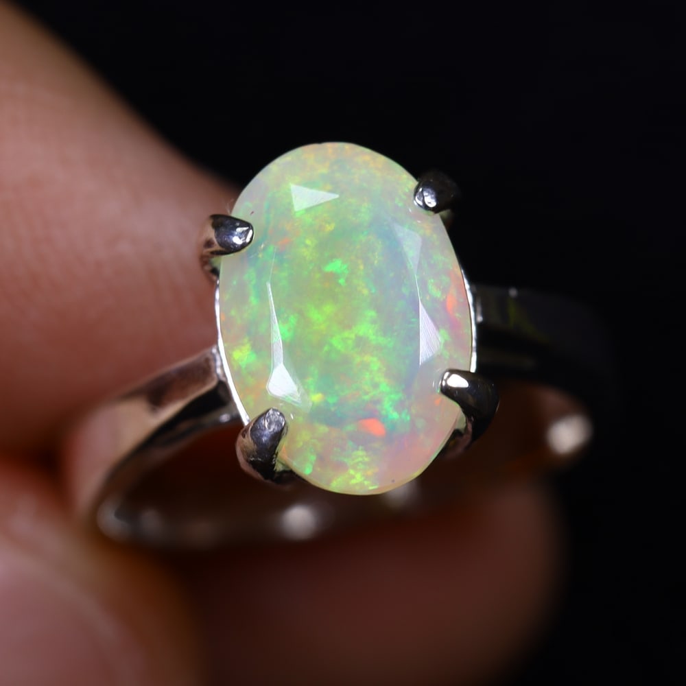 3.31g Natural Opal Stone Sterling Silver 925 Ring (Adjustable) , 941E: Ksmith Heritage Auctioneers Subject: Natural Ethiopian Opal Ring (Silver 925) Origin: Ethiopia Stone Dimension: 11x8mm Treatment: Natural Untreated Type: Faceted, Polished