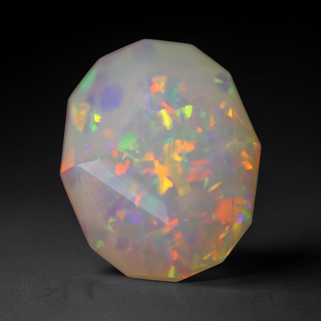 2.89Ct Special Cut Welo Opal Polished - Ethiopian Opal , 15E: Ksmith Heritage Auctioneers Subject: Natural Ethiopian Welo Opal Origin: Ethiopia Carat Weight: 2.89Ct Dimension: 12.4x10.1x5.6 mm Treatment: Unheated Type: Faceted, Polis