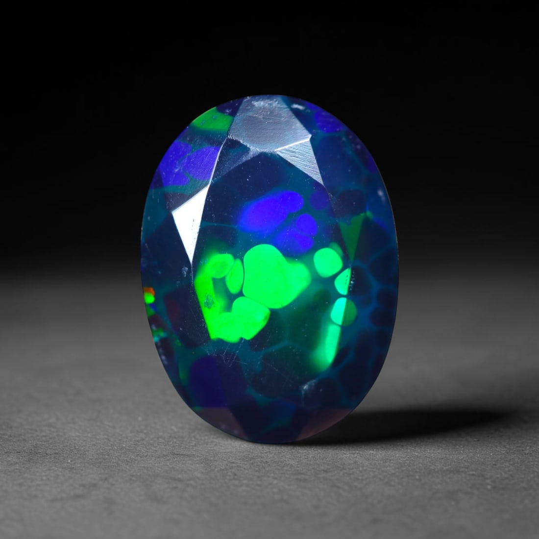 1.89Ct Natural Smoked Ethiopian Black Opal, Faceted Cut - 11.0x8.2x4.8 mm , 692C: Ksmith Heritage Auctioneers Subject: Natural Ethiopian Welo Opal Origin: Ethiopia Treatment: Smoked