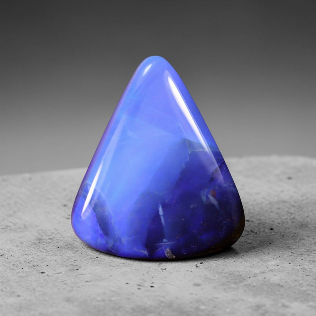 *9.54Ct Blue Boulder Opal - Australian Opal , 104E: Ksmith Heritage Auctioneers Subject: Natural Boulder Opal Origin: Australia Carat Weight: 9.54Ct Dimension: 16.6x14x5.1 mm Treatment: Natural Untreated Type: Cabochon, Pol