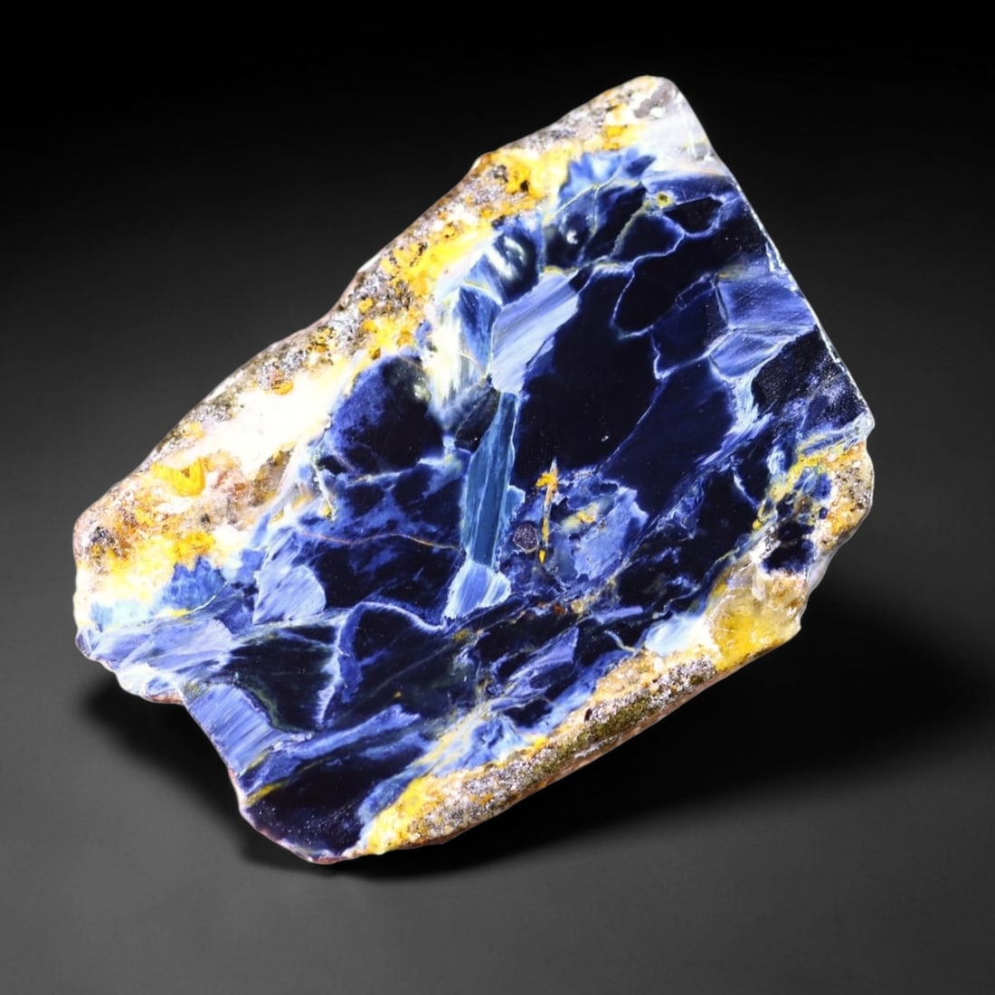36.22Ct Pietersite Slab - Gemstone Crystal - Freeform Slice, 639B: Ksmith Heritage Auctioneers Subject: Natural Pietersite Origin: Namibia, South Africa Carat Weight: 36.22Ct Dimension: 34.6 x 24.4 x 4.6 mm Treatment: Natural Untreated Shape:
