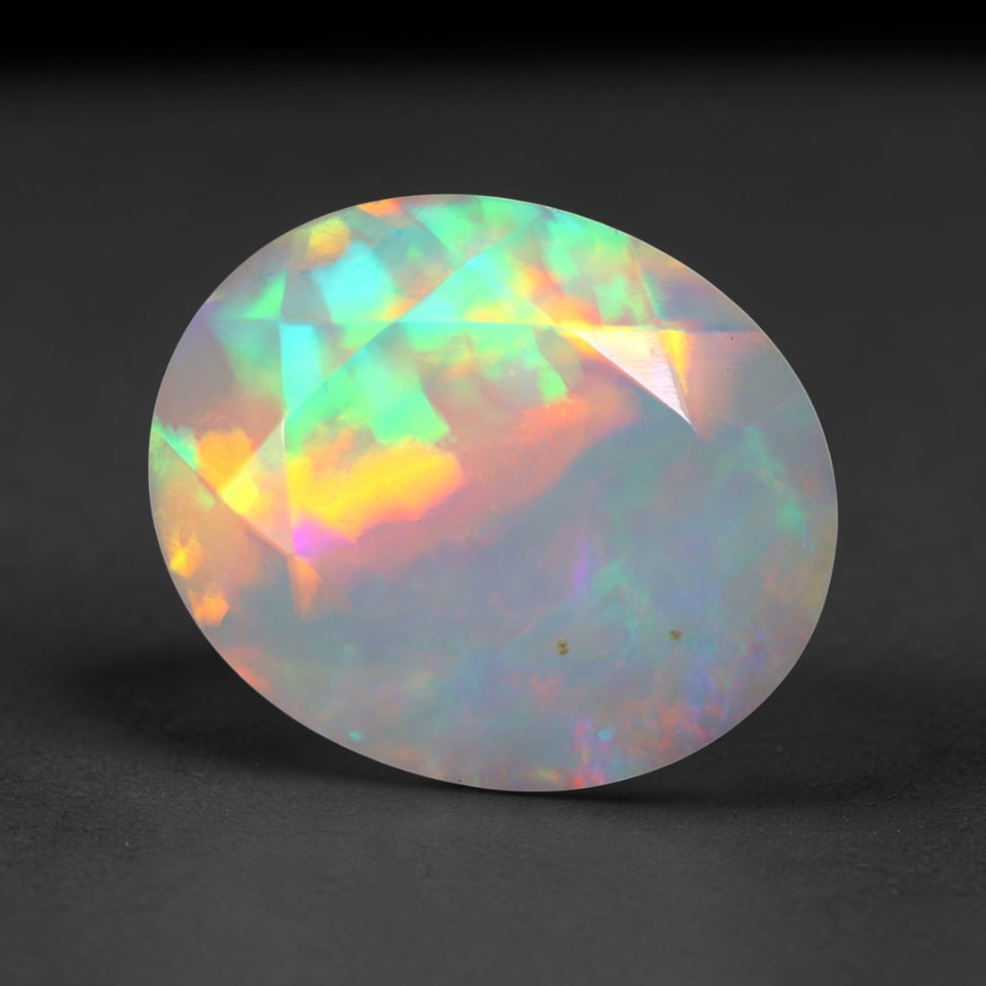 3.23Ct Natural Ethiopian Opal, Faceted Cut - 12.0x10.0x6.5 mm , 650C: Ksmith Heritage Auctioneers Subject: Natural Ethiopian Welo Opal Origin: Ethiopia Treatment: Unheated