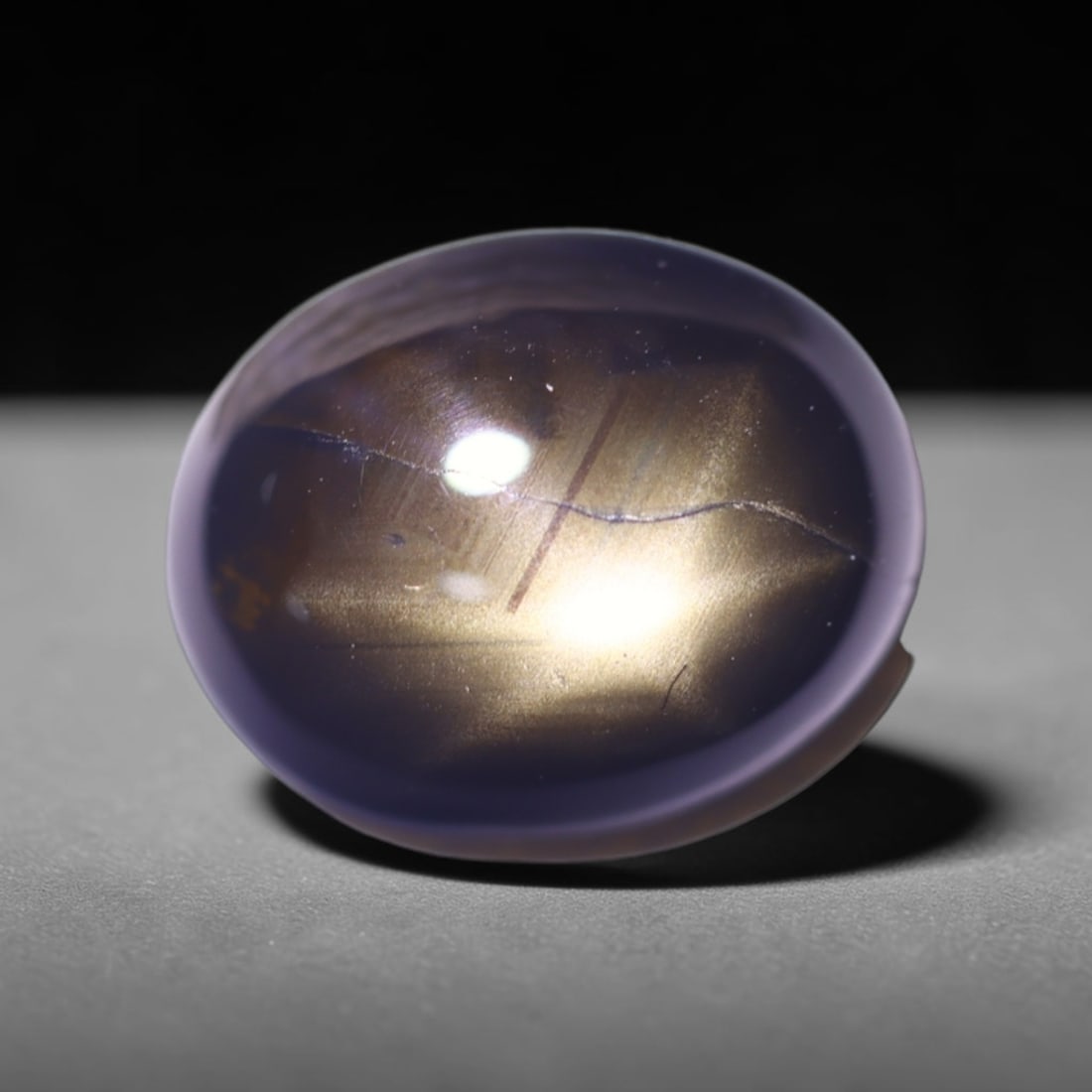 3.53cts 6 Rays Black Star Sapphire , 1204E: Ksmith Heritage Auctioneers Subject: Natural 6 Rays Star Sapphire Origin: Myanmar Carat Weight: 3.53cts Dimension: 9.8x7.7x4 mm Treatment: Diffusion Type: Cabochon, Polish