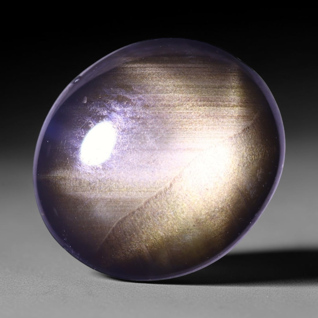 1.89cts 6 Rays Black Star Sapphire , 968E: Ksmith Heritage Auctioneers Subject: Natural 6 Rays Star Sapphire Origin: Myanmar Carat Weight: 1.89cts Dimension: 9.4x8.3x2 mm Treatment: Diffusion Type: Cabochon, Polish