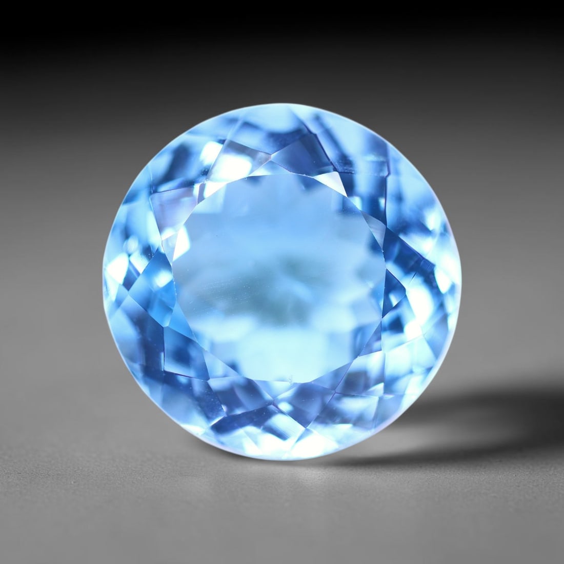17.06 carats Natural Swiss Blue Topaz - 15.8x15.6x9.0mm , 843C: Ksmith Heritage Auctioneers Subject: Natural Topaz Treatment: Irradiated Type: Faceted, Polished