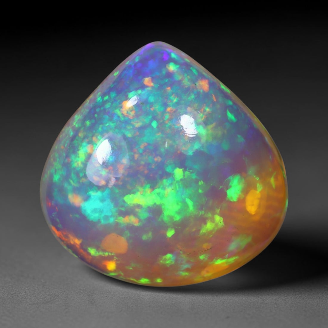 6.54Ct Natural Ethiopian Opal , Unheated - 14.4x14.3x7.3 mm , 828C: Ksmith Heritage Auctioneers Subject: Natural Ethiopian Welo Opal Origin: Ethiopia Treatment: Unheated