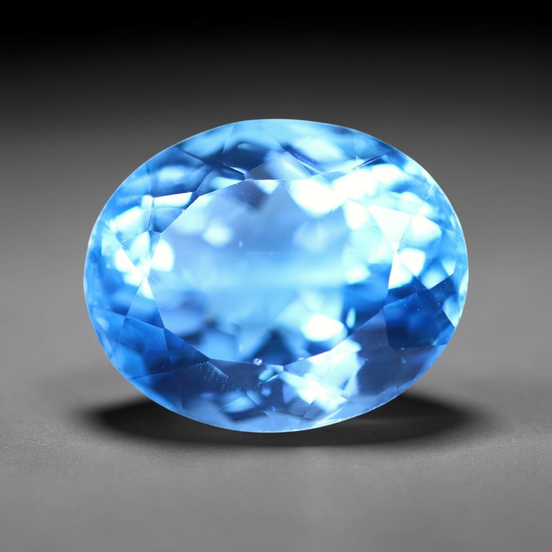 17.59 carats Natural Swiss Blue Topaz - 16.6x13.5x9.7mm , 845C: Ksmith Heritage Auctioneers Subject: Natural Topaz Treatment: Irradiated Type: Faceted, Polished