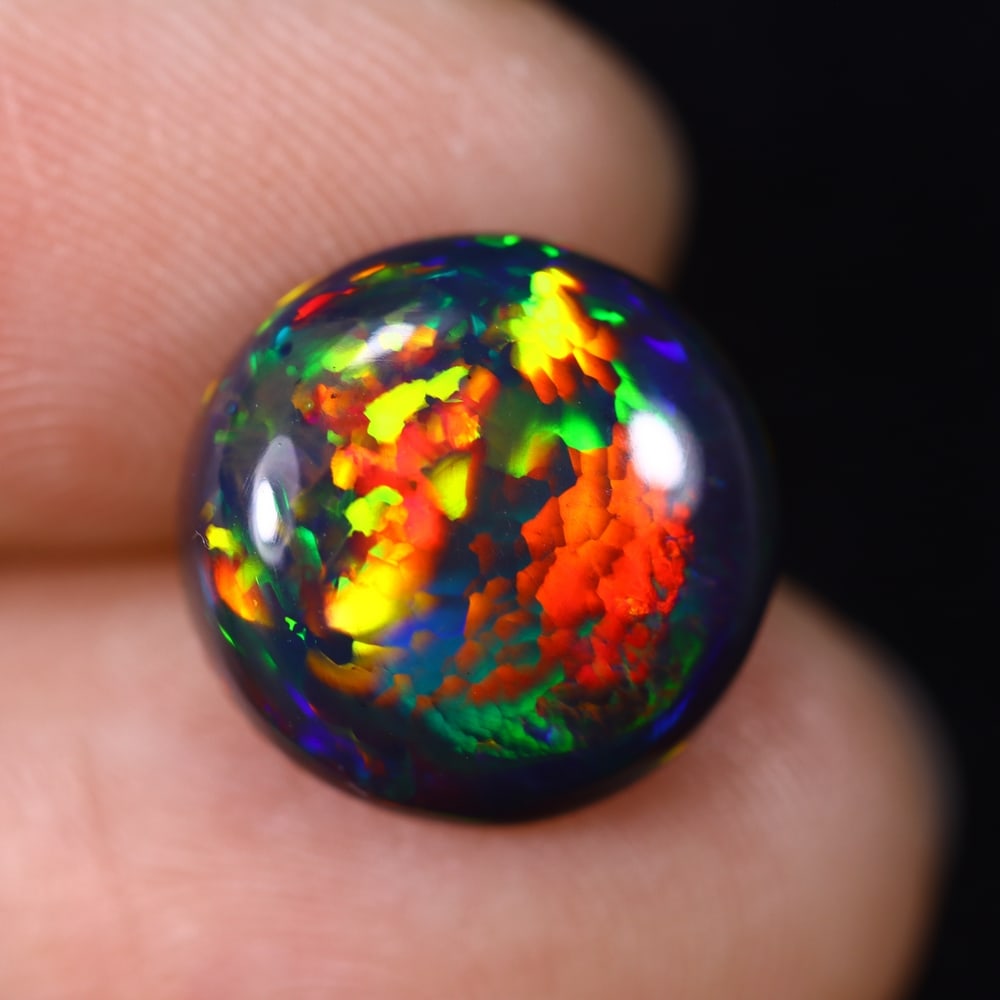 4.45Ct Natural Ethiopian Black Opal - 12.6x12.6x5.3 mm , 615C: Ksmith Heritage Auctioneers Subject: Natural Ethiopian Welo Opal Origin: Ethiopia Treatment: Smoked