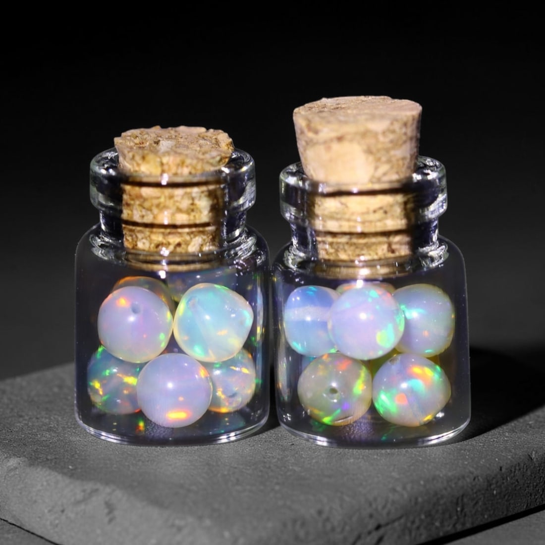 Twin Pack - 4.5mm Ethiopian Opal Ball in Display Jar - Bottle Size 1.5cm , 82C: Ksmith Heritage AuctioneersSubject: Natural Opal (with bottle) Origin: Ethiopia Treatment: Unheated
