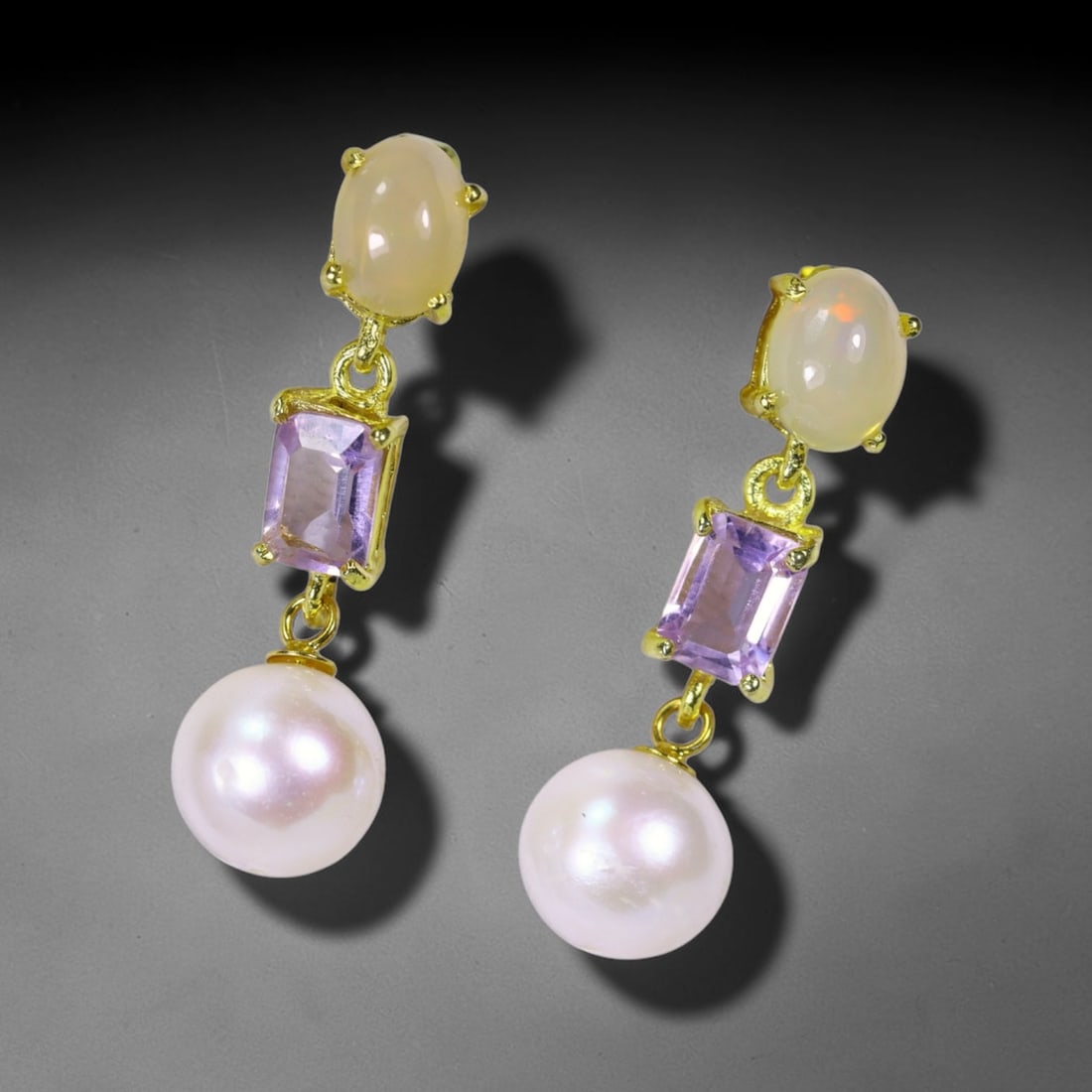 Earrings Pearl Amethyst & Opal - 925 Sterling Silver , 53E: Ksmith Heritage Auctioneers Subject: Natural Pearl, Amethyst & Opal Origin: Thailand Carat Weight: 27.13ct Dimension: Gemstone 5x7mm Type: Earrings