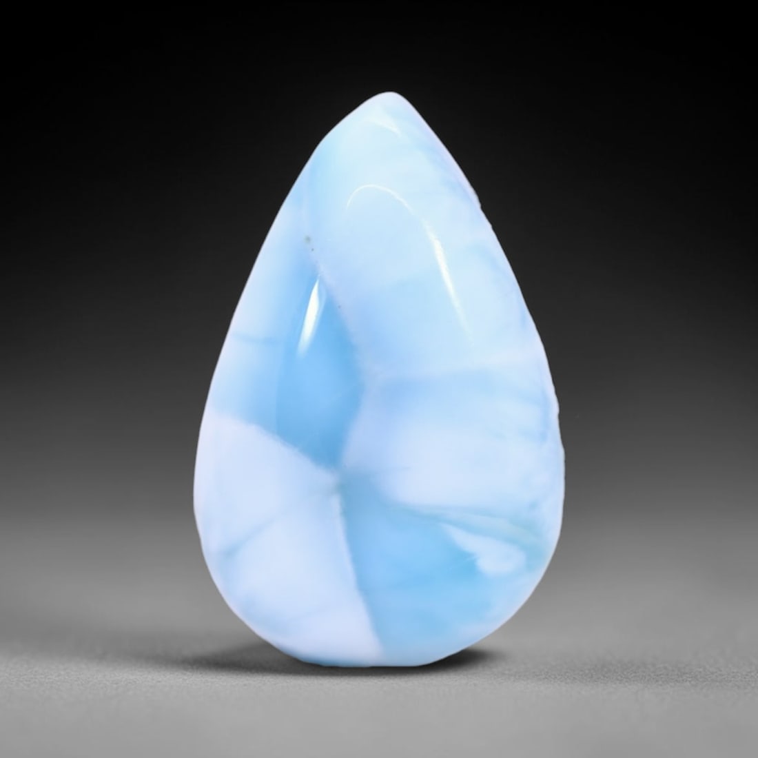 *14.19Ct Natural Larimar - Polished Cabochon , 237C: Ksmith Heritage Auctioneers Subject: Natural Larimar Carat Weight: 14.19 Ct Dimension: 13.4x12x6.3 mm Type: Cabochon, Polished
