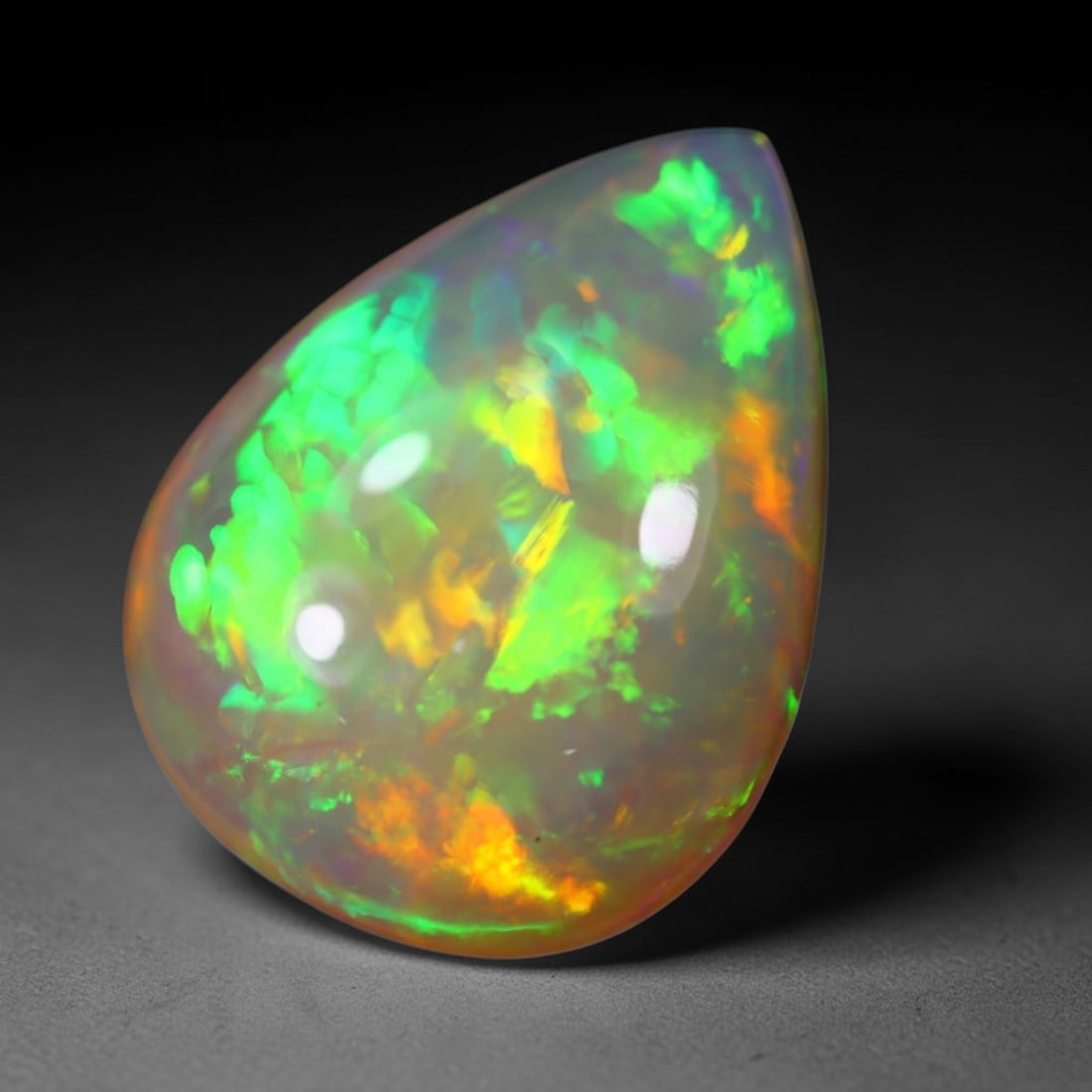 *11.76Ct Welo Opal Polished - Ethiopian Opal , 96E: Ksmith Heritage Auctioneers Subject: Natural Ethiopian Welo Opal Origin: Ethiopia Carat Weight: 11.76Ct Dimension: 20.1x15.4x8.1 mm Treatment: Natural Untreated Type: Cabo