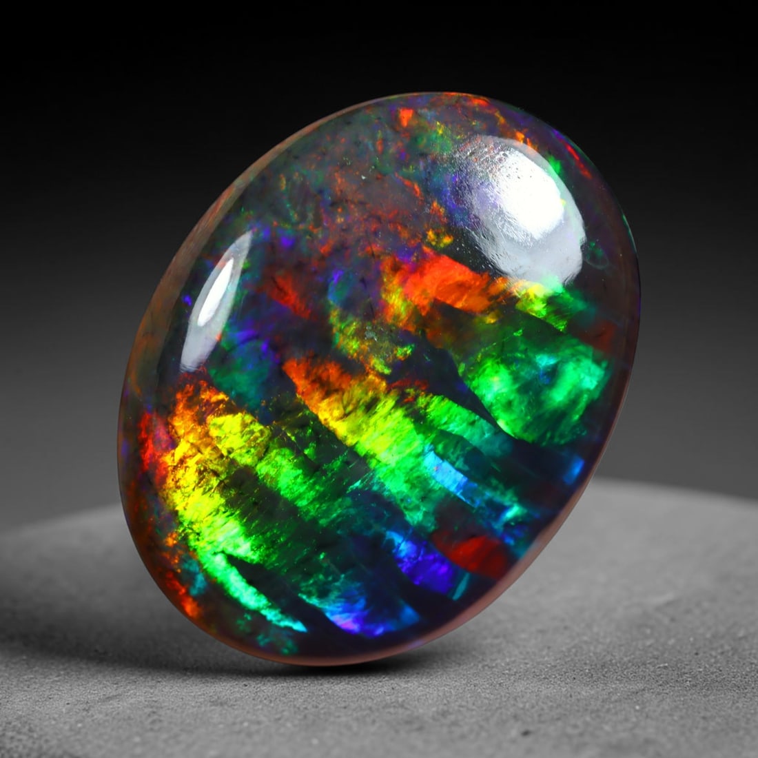 5.11Ct Natural Ethiopian Black Opal - 18.7x14.7x3.8 mm , 815C: Ksmith Heritage Auctioneers Subject: Natural Ethiopian Welo Opal Origin: Ethiopia Treatment: Smoked