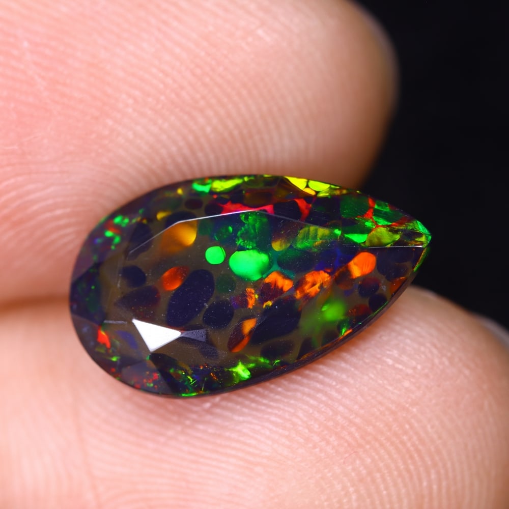 2.33Ct Smoked Faceted Ethiopian Opal - 15.0x8.7x4.7 mm , 535C: Ksmith Heritage Auctioneers Subject: Natural Ethiopian Welo Opal Origin: Ethiopia Treatment: Smoked Type: Faceted, Polished