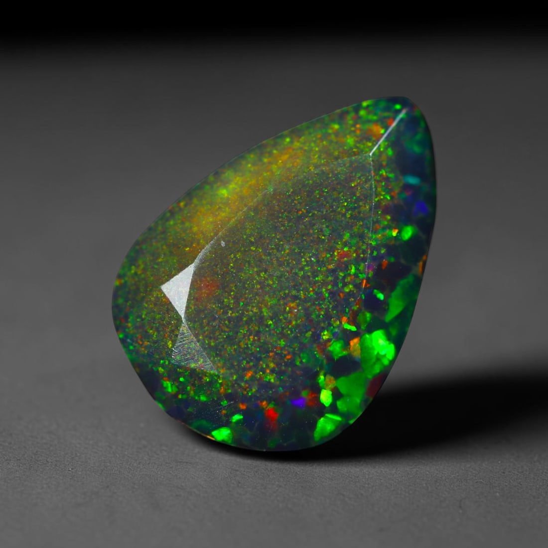 3.04Ct Natural Smoked Ethiopian Black Opal, Faceted Cut - 12.4x8.9x6.4 mm , 696C: Ksmith Heritage Auctioneers Subject: Natural Ethiopian Welo Opal Origin: Ethiopia Treatment: Smoked