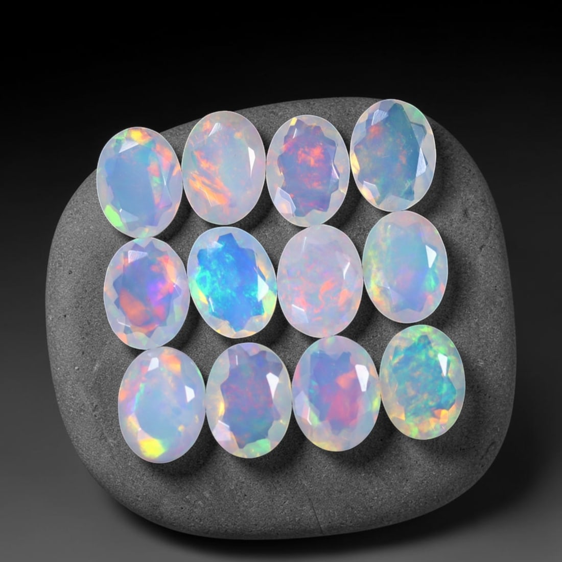 *9.13Ct 12pcs Calibrated 8x6mm Faceted Welo Opal Set - Ethiopian Opal, 127B: Ksmith Heritage Auctioneers Subject: Natural Ethiopian Welo Opal Origin: Ethiopia Carat Weight: 9.13Ct Treatment: Natural Untreated Type: Faceted, Polished
