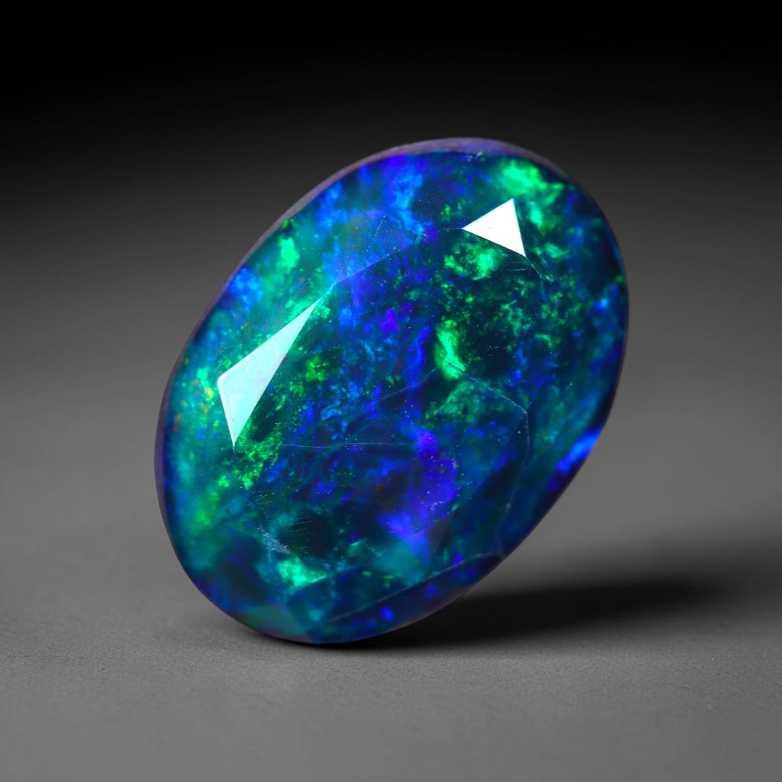 2.39Ct Natural Smoked Ethiopian Black Opal, Faceted Cut - 11.1x7.9x6.0 mm , 723C: Ksmith Heritage Auctioneers Subject: Natural Ethiopian Welo Opal Origin: Ethiopia Treatment: Smoked